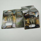 O rinoceronte 7 5000 encerra o cartão da bolha que empacota a caixa de exposição sexual masculina de papel dos comprimidos 3D