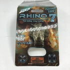 O rinoceronte 7 5000 encerra o cartão da bolha que empacota a caixa de exposição sexual masculina de papel dos comprimidos 3D