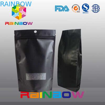 O empacotamento preto dos malotes plásticos de 70g 100g 250g 500g levanta-se o saco de feijão do café com válvula