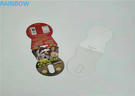 Um cartão de papel do comprimido ajustado do sexo que empacota a cor vermelha do costume do cartão da bolha do rinoceronte V7 da tira