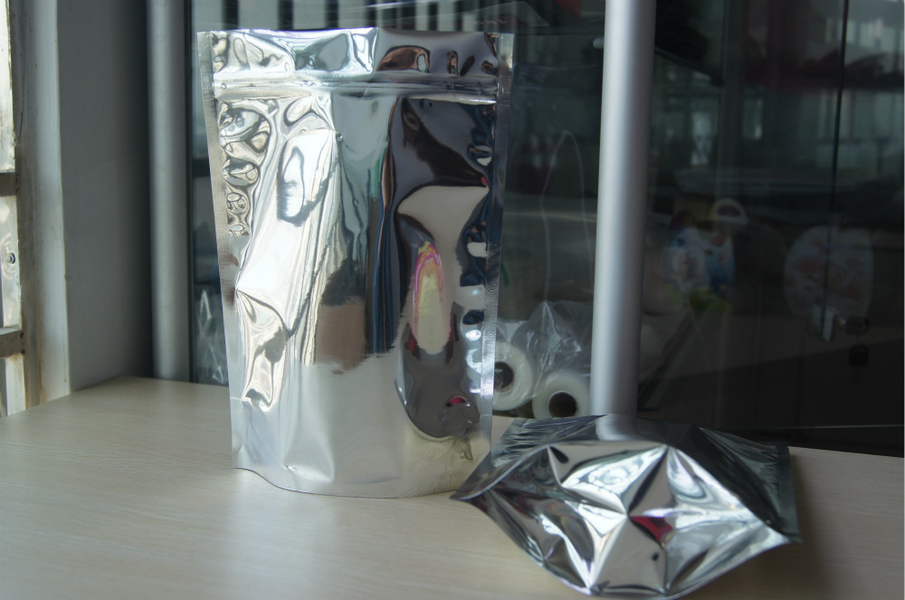 Os sacos Ziplock lisos personalizados da folha de alumínio/levantam-se o empacotamento do malote da folha