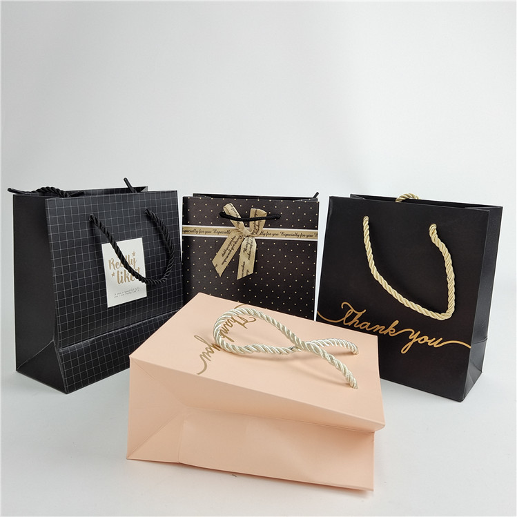 Impressão digital personalizada de alta qualidade Logotipo Impresso Saco de papel de compras Embalagem Branca 110 gramas Reutilizável