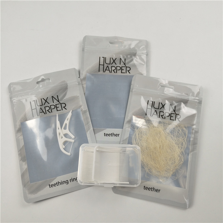 Empacotamento personalizado dianteiro claro lustroso do saco do fechamento do fecho de correr da folha de alumínio dos sacos de plástico do furo do cair de fio dental